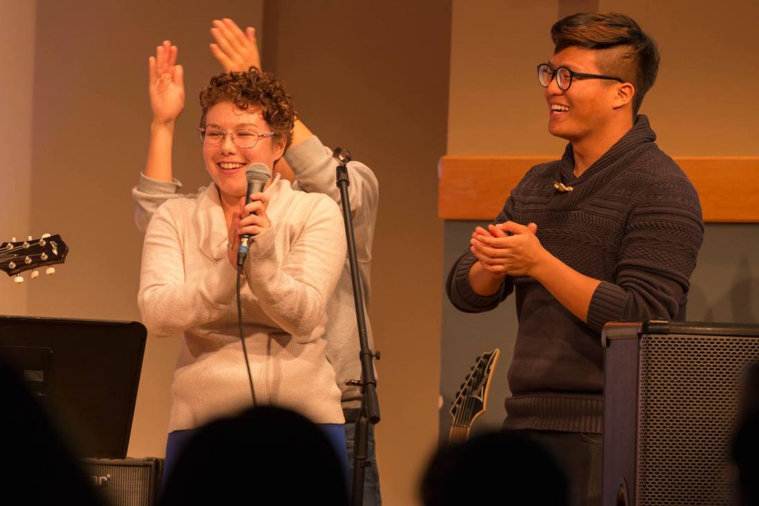 Leading worship at a multicultural worship night. PC: Wheaton College Student Activities Office